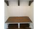 Mudroom with a wooden bench and white paneled walls at 421 Delburg Mill Alley Dr, Davidson, NC 28036