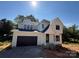 Bright, newly built home shows detailed architecture with dormer windows and black window frames at 426 Richards Ln, Mooresville, NC 28115