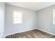 Empty bedroom features hardwood floors, a window for natural light, and neutral paint at 4926 Nc Highway 109 South, Mount Gilead, NC 27306