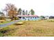 Lovely home with a red roof, carport, and a large yard, offering comfortable living space at 4926 Nc Highway 109 South, Mount Gilead, NC 27306