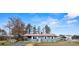 Charming single-story home with a red roof, a carport, and a well-maintained front yard at 4926 Nc Highway 109 South, Mount Gilead, NC 27306