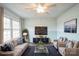 Inviting living room featuring neutral decor, modern furnishings, and ample natural light at 4926 Nc Highway 109 South, Mount Gilead, NC 27306