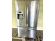 Stainless steel refrigerator with water and ice dispenser is a modern kitchen appliance at 4926 Nc Highway 109 South, Mount Gilead, NC 27306