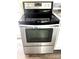 Stainless steel Whirlpool stove with glass top and oven, set against white cabinets at 4926 Nc Highway 109 South, Mount Gilead, NC 27306