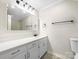 Bathroom with white vanity and mirrored medicine cabinet at 500 Kirby Ln, Matthews, NC 28104