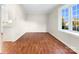 Simple dining room with hardwood floors and large window at 500 Kirby Ln, Matthews, NC 28104