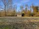 Detached shed with covered carport in the backyard at 500 Kirby Ln, Matthews, NC 28104