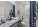 Bathroom with tub and shower and granite countertop at 5029 Westmead Ln, Charlotte, NC 28262