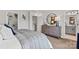 Main bedroom with large dresser and ensuite bathroom at 5029 Westmead Ln, Charlotte, NC 28262