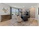 Modern home office features a built-in desk, stylish decor, and large windows at 5029 Westmead Ln, Charlotte, NC 28262
