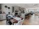 Open concept kitchen featuring gray cabinets and an island at 5029 Westmead Ln, Charlotte, NC 28262