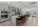 Modern kitchen with island, stainless steel appliances, and ample counter space at 5029 Westmead Ln, Charlotte, NC 28262