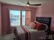 Guest bedroom with a double bed and calming color scheme at 5860 Clan Maclaine Dr, Charlotte, NC 28278