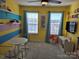 Bright bedroom with colorful decor and plenty of natural light at 5860 Clan Maclaine Dr, Charlotte, NC 28278