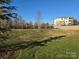 Open green space in a residential community at 5860 Clan Maclaine Dr, Charlotte, NC 28278