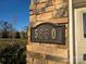 House number 5860 displayed on a stone exterior at 5860 Clan Maclaine Dr, Charlotte, NC 28278