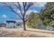 Spacious backyard offering privacy and mature trees at 710 N Cedar St, Lincolnton, NC 28092