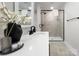 Bathroom with white vanity, quartz countertop and glass shower at 710 N Cedar St, Lincolnton, NC 28092