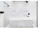 Clean bathroom with a tub and shower at 710 N Cedar St, Lincolnton, NC 28092