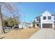 Two-story home with dark brown garage door at 710 N Cedar St, Lincolnton, NC 28092