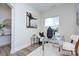 Bright home office features a glass desk and comfortable seating at 710 N Cedar St, Lincolnton, NC 28092