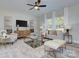 Open concept living room with a cozy seating arrangement at 710 N Cedar St, Lincolnton, NC 28092