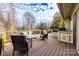 Spacious deck with outdoor furniture, a built-in grill, and wooded views at 78 Honeysuckle Woods, Lake Wylie, SC 29710