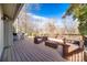 Relaxing deck with seating area, offering a tranquil view of the backyard at 78 Honeysuckle Woods, Lake Wylie, SC 29710