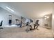 Home gym with various exercise equipment for a healthy lifestyle at 78 Honeysuckle Woods, Lake Wylie, SC 29710
