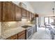 Granite countertops and stainless steel appliances highlight this kitchen at 78 Honeysuckle Woods, Lake Wylie, SC 29710