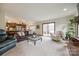 Spacious living room with open floor plan, featuring a view of the backyard at 78 Honeysuckle Woods, Lake Wylie, SC 29710