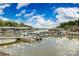 Waterfront marina with boat slips and a dock at 78 Honeysuckle Woods, Lake Wylie, SC 29710