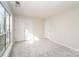 Neutral bedroom featuring a double door closet, neutral walls and carpet at 8624 Woodcock Ln, Charlotte, NC 28216