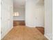 Spacious foyer with neutral tile flooring offers a seamless transition to other areas of the home at 8624 Woodcock Ln, Charlotte, NC 28216