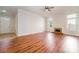 Spacious living room boasts laminate flooring, a cozy fireplace, and lots of natural light at 8624 Woodcock Ln, Charlotte, NC 28216