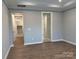 Bedroom with access to bathroom and laundry room at 9625 Liberty Hill Dr, Mint Hill, NC 28227