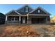 Charming two-story home with gray and brown exterior at 9625 Liberty Hill Dr, Mint Hill, NC 28227
