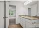Bathroom with double vanity and granite countertop at 10006 Travis Floyd Ln # 002, Charlotte, NC 28214