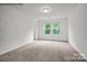 Bedroom with two windows and a view at 10006 Travis Floyd Ln # 002, Charlotte, NC 28214