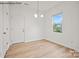Bright dining room with hardwood floors and a chandelier at 10006 Travis Floyd Ln # 002, Charlotte, NC 28214