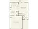 First floor layout; kitchen, great room, garage at 10006 Travis Floyd Ln # 002, Charlotte, NC 28214