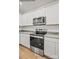 Modern kitchen with stainless steel appliances and granite countertops at 10006 Travis Floyd Ln # 002, Charlotte, NC 28214