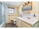 Bathroom with double vanity and bathtub at 107 E Boyd St, Maiden, NC 28650