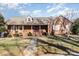 Brick ranch house with a spacious lawn and mature trees at 107 E Boyd St, Maiden, NC 28650