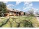 Side view of brick house with yard and street at 107 E Boyd St, Maiden, NC 28650