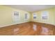 Living room with hardwood floors and natural light at 107 E Boyd St, Maiden, NC 28650