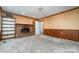 Living room with brick fireplace and built-in shelves at 107 E Boyd St, Maiden, NC 28650