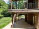 Multi-level deck and patio area perfect for outdoor entertaining and relaxation in a private backyard at 254 Streamside Pl, Mooresville, NC 28115