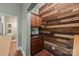 Basement wet bar with wood wall at 254 Streamside Pl, Mooresville, NC 28115