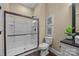 Modern bathroom with a large shower and updated fixtures at 254 Streamside Pl, Mooresville, NC 28115